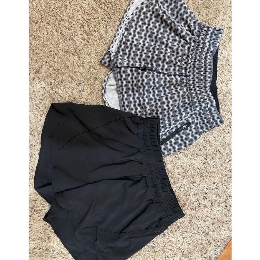 Lululemon Hotty Hot Shorts. 2 pair both size 6. All black and a fun design.